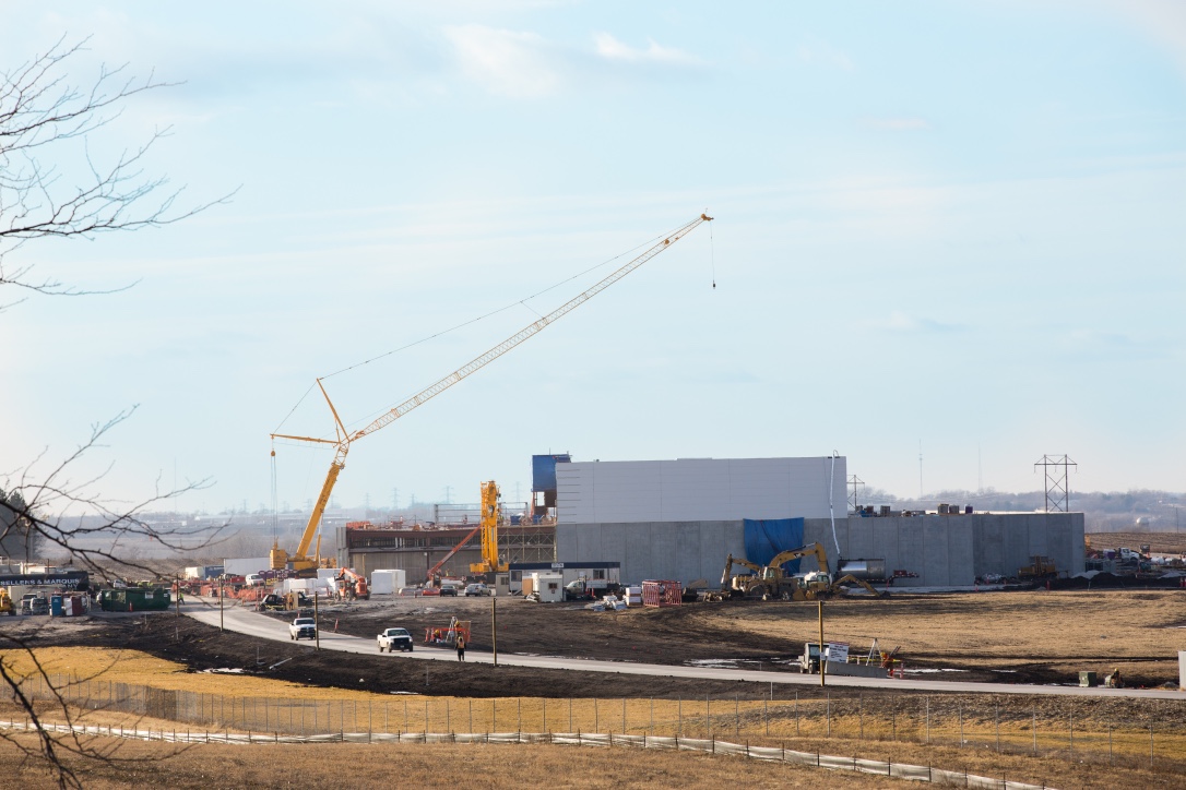 Lattice boom crane on a construction site