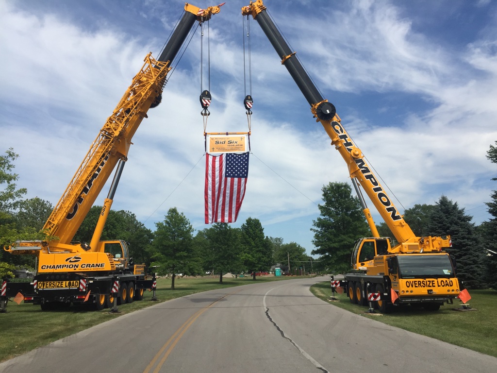 Two Champion cranes working a controlled monopole lift