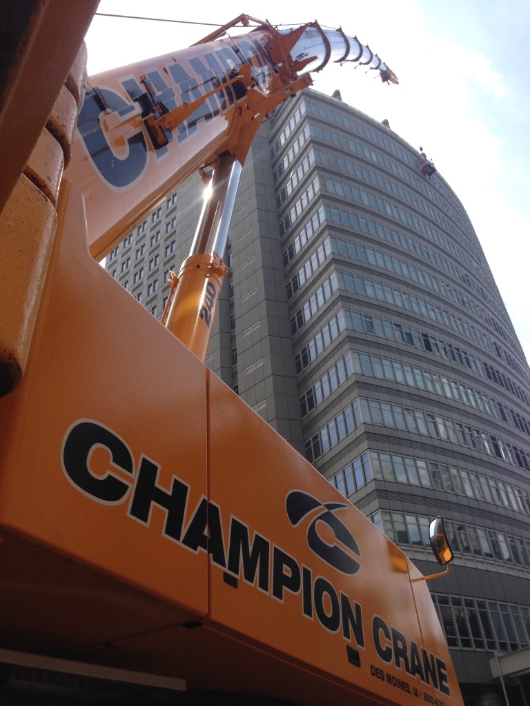 Urban boom crane angled skyward